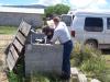 57 Pastor Jeff and Bro. French working on the water pump